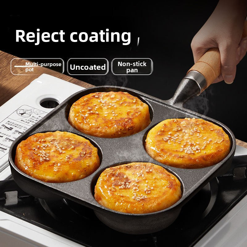 Household cast iron 4-hole frying pan
